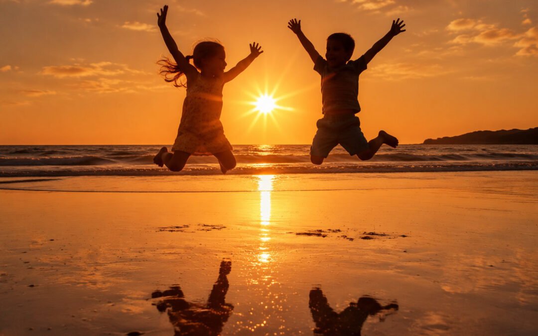Mamma che fotografa i bambini durante una vacanza al mare con il telefono
